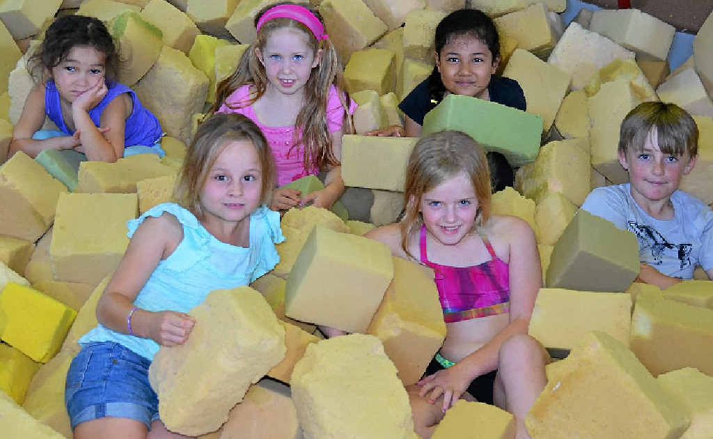 Mykeisha Duncan, Ava McLucas, Muffy Malolo, (front) Haylee Beckhouse, Emily Lane and Angus McKay in the foam pit.